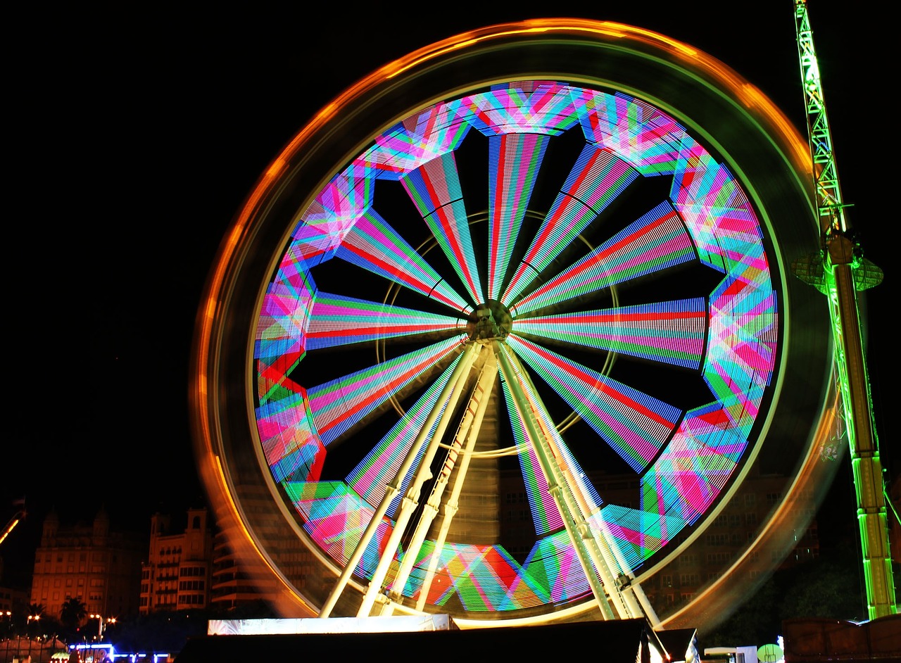 Ferris wheel lit up in the dark